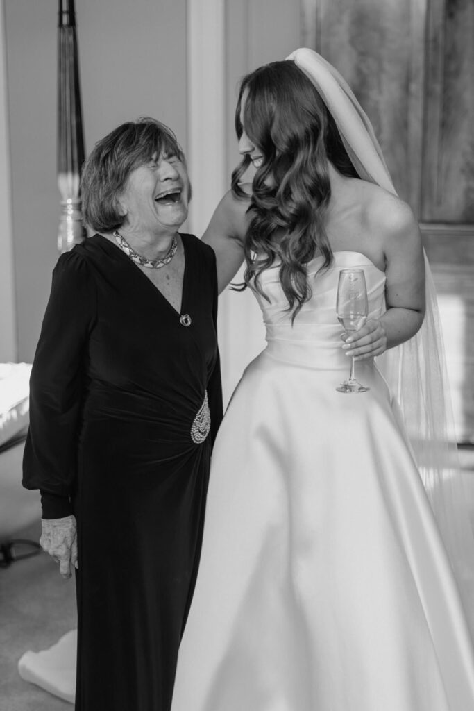 Bride & grandma laughing