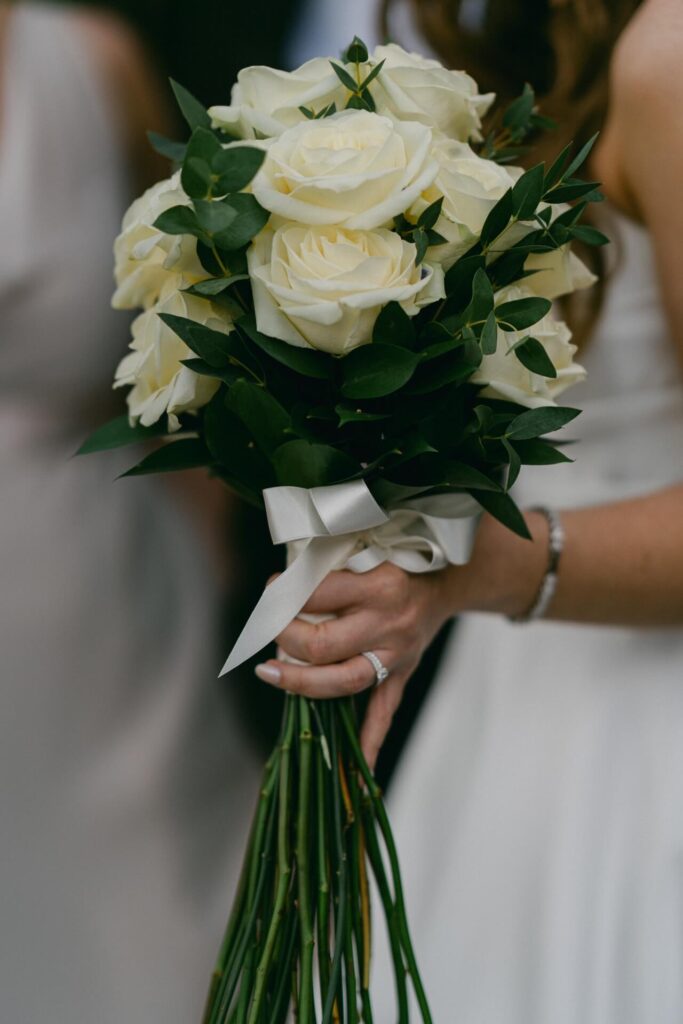 Long stemmed white rose bridal bouquet
